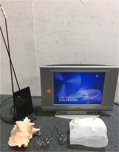 (1) Sylvania 15&rdquo; LCD Tv/DVD Combo (1) RCA Tv Antenna (1) Hamilton Beach Hand Mixer (1) Seashell