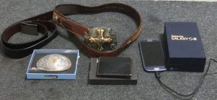 (2) Mens Belts (2) Nocona Belt Buckles (1) New Lodi’s Leather Wallet (1) Samsung Galaxy S3 With Original Box