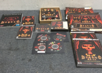 (1) Large Diablo and Diablo II Pc Computer Games (2) Bradygames Diablo II Strategy Guide (1) Diablo Strategy Guide