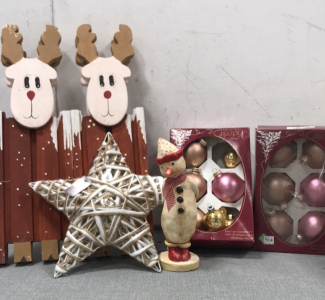 (4) Wooden Christmas Reindeer , (1) Decoration White and Wooden Star, (1) Decoration Snow Man, (2) Packs Of Pink and Rose Gold Ordaments