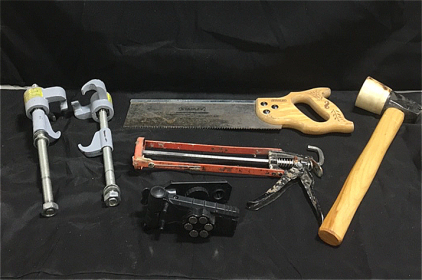 (1) Pair Of Struts Coil Spring Compressor Tool (1) Stanley 12&rdquo; Hand Saw (1) Wood Handle Mallet (1) Caulking Gun