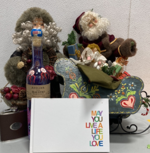 (1) May you live a life you love book, (2) Decorative Santa Clauses, (1) Liquor Flask, (1) Atelier Del Maestro Empty Tequila Bottle