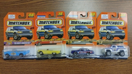 (4) Assorted Matchbox Cars
