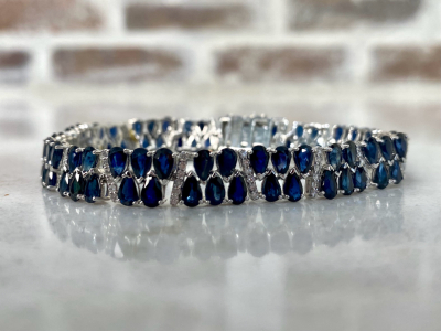 $9,470 Value - 14K White Gold Sapphire Corundum & Diamond Bracelet