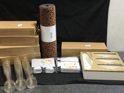 (60) Gold Plastic 6.5oz Champagne Flutes (1) Rubber Backed 17.5” x 55” Mat (20) Michelob Slim Can Drink Coozies (1) Ziploc Bag Organizer (1) Black Counter Top Wine Rack (need assembly )