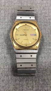 Seiko Silver Band/Gold Face Watch