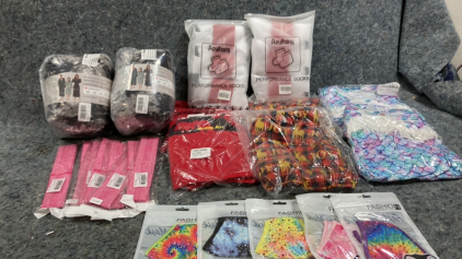 (6) Shirts (2) Fleece (2) Packs of Socks- (5) Masks (8) Sweat Bands