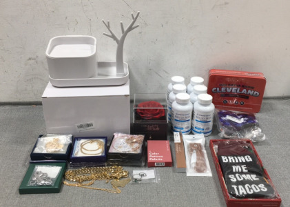 (3) Plastic Jewelry Holders, (6) Bottles of Irish Sea Moss, Cleveland Sports Trivia Game, Tacos Socks, Various Jewelry, Small Eyeshadow Palatte, Eyebrow Pencil, Earwax Cleaner, Cloth Masks, Rose Jewelry Box