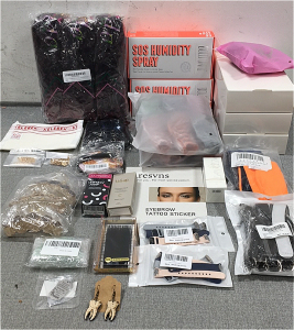 (3) Wigs, Pack of Goddess Locks, Bun Wig Attachment, Hair Clips, (2) Humidity Hair Spray, Head Bands, Eyebrow Tattoo Stickers, Galaxy Fit Bands, Faux Eyelashes, Anti-Aging Oil, (2) &ldquo;M&rdquo; Bracelets, Wood Tooth Earrings, Eyebrow Stamp and more