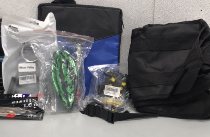 (1) Black Weight Bag, (1) Pack of Fishing Lures, (1) Rhino Valley 50MM Barbell Clip 2 Pack Black, (4) Ice Cleats (10 Spikes), (1) Watermelon Ball Pool Toy, And More