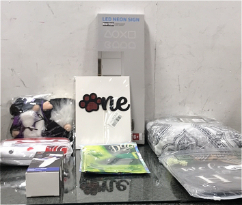 (1) Dog Paw One Sign, (2) Purple and Black Gnomes, (1) LED Neon Sign, (1) Welcome to our Home Switchable Sign, (1) Vive Fox Dual Charger Dock, and more