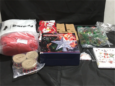 (1) Christmas Tree Topper LED Projector Light (16) Metal Stocking Holders (3) Rolls Of Christmas Ribbon (1) Santa Clause Costume For Dogs (24) Christmas cards (1) Christmas Wreath and More Christmas Items