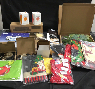 (1) 12&rdquo; Pink Moving Sandscapes Decoration (8) Packs Of Christmas Decorations (1) Do it Yourself Welcome Wreath (2) Sets Of LED String Lights (4) Stocking Holders (2) Scented Candles and More!!