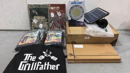 (2) Barn Lamps, (1) Small Solar Panel, (2) Wood Home Signs, &ldquo;Grill Father&rdquo; Apron, (2) Patio Heater Covers, Box of 6 Post Solar Lights, (2) Metal Mechanica Tools Signs, Metal Jeep Sign