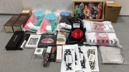 (3) Hair Care Sets, Hair Clips, (2) Head Scrubbers, Aroma Diffuser, Socks, Body Chain Jewelry, Massage Ball Roller, (4) Apple Watch Straps, False Lashes, (4) Lip Color Products, Press On Nails, Eyebrow Pencil, Blackhead Remover Kit, Highlighter