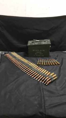 (73) Various Brand .50 Caliber Cartridges On Machine Gun Belt (1) .50 cal Ammo Box