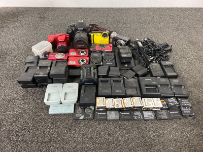 Large Assortment of Digital Cameras, Batteries, Chargers and More