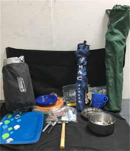 (2) Foldable Camping Chairs (2) 12&rdquo; x 16&rdquo; Food trays (7) Plastic Camping Dinner Plates (2) Bags of Miscellaneous Camping Supplies (1) MSR Cooking Set (1) Coleman Air Matress