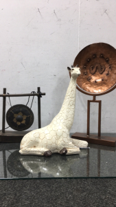 (1) Antique White Glass Giraffe, (1) Dark Brown and gold Gong, (1) Copper Colored Display Decoration