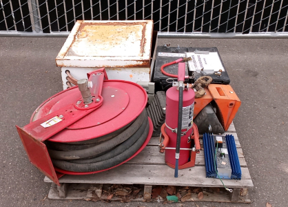 Pallet with Oil Hose Reel, Batteries, and More