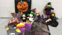 Halloween Items: (3) Long Holographic Posters, (9) Various Pushies, Table Cover, (3) Hanging Spooky Characters, Hanging Bat, (3) Various Cups, Hanging Cloth Pumpkin and more