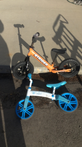 (1) Strider Kids Push Bike (1) Velo Junior Push bike