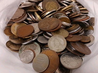 Bag Full of Foreign Currency Coins