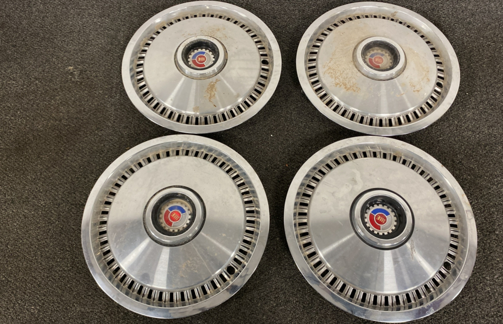 (4)60s Ford Galaxy Hub Caps.