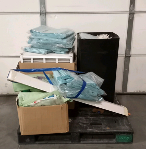 Pallet with Industrial Floor Cleaning Filters and Supplies