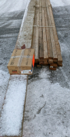 Bunk of Assorted Building Lumber w/Case of Hangers