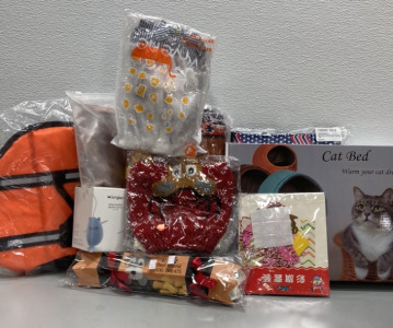 (1) Cat Bed, (1) Dog Treats, (1) XL Knitted Dog Christmas Sweater, and more