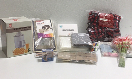 (1) Woofheld No Bark Collar (2) Majestic Chef Turkey Prep Kits (1) 59” x 79” Sun And Moon Tapestry (10) Buffalo Plaid Bows (1) Shower Brush For Pets (1) Smarty Cat Sisal Angle Scratcher (1) Wowow Juicer Extractor And other Household Items