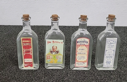 Set of (4) Antique Vanilla and Lemon Extract Bottles and Dr. Smiths Warranted Bottle