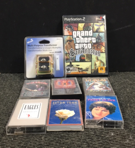 (1) PlayStation 2 Grand Theft Auto SanAndreas Video Game, (1) Wired Multi-Purpose Transformer, (1) Country Great Patsy Cline Cassette Tape, (1) Elton John Somethig about the way you look tonight Cassete Tape NEW in Packaging, and more