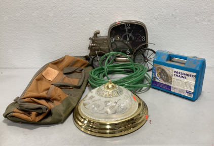 (1) Tire Chains, (1) Ceiling Light Fixture, (1) Pneumatic Hose, (1) Lusardi Construction Bag, (1) Old Car Themed Clock