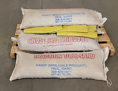 (4) 70lb Sand Bags and Extra Sand Bags