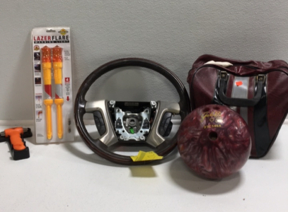 (1) 2010 Cadillac Escalade Steering Wheel (2) Lazerflare Warning Light Flares (1) Glass Breaker Seat Belt Cutter (1) Galaxie 300 10.5lb Bowling Ball With Case