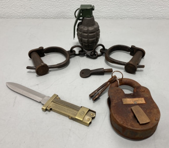 (1) WWII MK2 US Pineapple Grenade (Inert), (1) Pony Express Iron Lock W/ Keys, (1) Pair Iron Shackles W/ Key, (1) Brass Toned Scissor Action Paratroopers Knife W/ German Language & WWII Markings