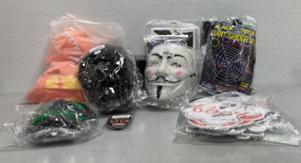 (1) Glow in The Dark Halloween Mask, (1) Set of 6 Iron on Skull Patches, (4) White Halloween Masks, (1) Black Widow giant Spider, (1) Pack of Halloween Yard Signs, and more SP13