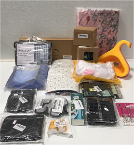 (1) Blackout Floral Curtains (1) Decorative Pillow Cases (1) Floor Mat (1) Welcome Sign (1) Floral Laptop Case (3) Silicone Sink Splash Guard (1) Sink Swans (2) Sauce Boss Containers and More SP17