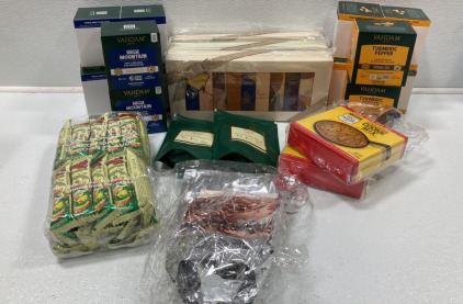 (6) High Mountain Oolong Tea, (6) Turmeric Pepper Tea, (3) Assorted Hot Chocolate, (2) Cast Iron and Cookie Mix, (2) Mango Spice Iced Tea, Pack of Corn Snacks, Organic Flax Seeds SP16