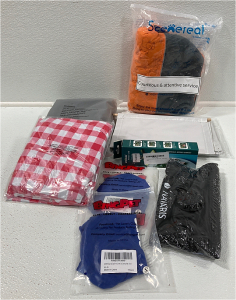 Tablecloths, (2) Small Dog Vests, Large Dog Jacket, Camping Shower, Kitchen Gardget, Drawing Cases SP18