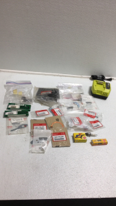 (1) Ryobi 40v Battery Charger (2) Ngk Spark Plugs (2) Cemellia 86 Link ATV Cam Chains (1) Large Lot Of Various ATV Parts