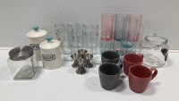 (8) Drinking Glasses, (8) Plastic Cups, (4) Jars, (4) Coffee Mugs, (4) Double Sided Measuring Pegs