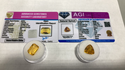 (1) 7.00ct Natural Madeira Citrine Gemstone, 12.05ct Natural Yellow Spinel Trillion Cut Gemstone. Both W/ COA