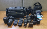 Minolta Camera with (4) Flash Attachments, (10) Lenses, Sony Handycam and More