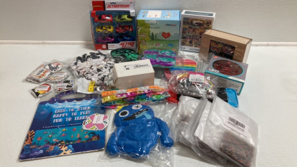 Unicorn Plushes, 500pc Puzzle, 175pc Wood Puzzle, UFO Drone, Fidget Poppers, Waterbeads, ActionTeam Cars, Stickers, Cow Keychains
