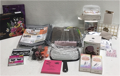 (1) Pair Madison Avenue Eyeglasses (1) Rotating Jewelry Organizer (2) Jade Roller Wrinkle Removers (2) Sets Of False Eyelashes (7) LE Secret Hair Extensions (1) Newrice Lego Flower Set and Much More For The Woman In Your Life!