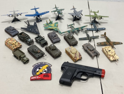 (11) Various Military Planes And Jets, (9) Various Military Tanks, (3) Military Vehicles, (1) 2013 Pit Crew Chalenge Patch, (1) Double Eagle M31 Toy Gun