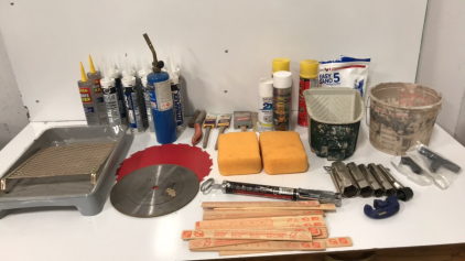 (9) Bottles Of Caulking-Torch-Saw Blades-Painting Dish-(13) Leavl Sticks-Painting Brushes and more